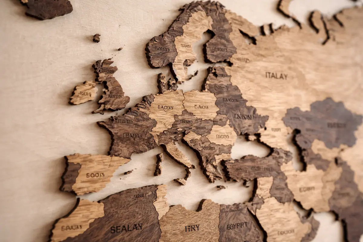 wooden-wall-map-layered-construction-detailwebp - Modern Wall Art Guides Close-up detail of a wooden world map used as modern wall art